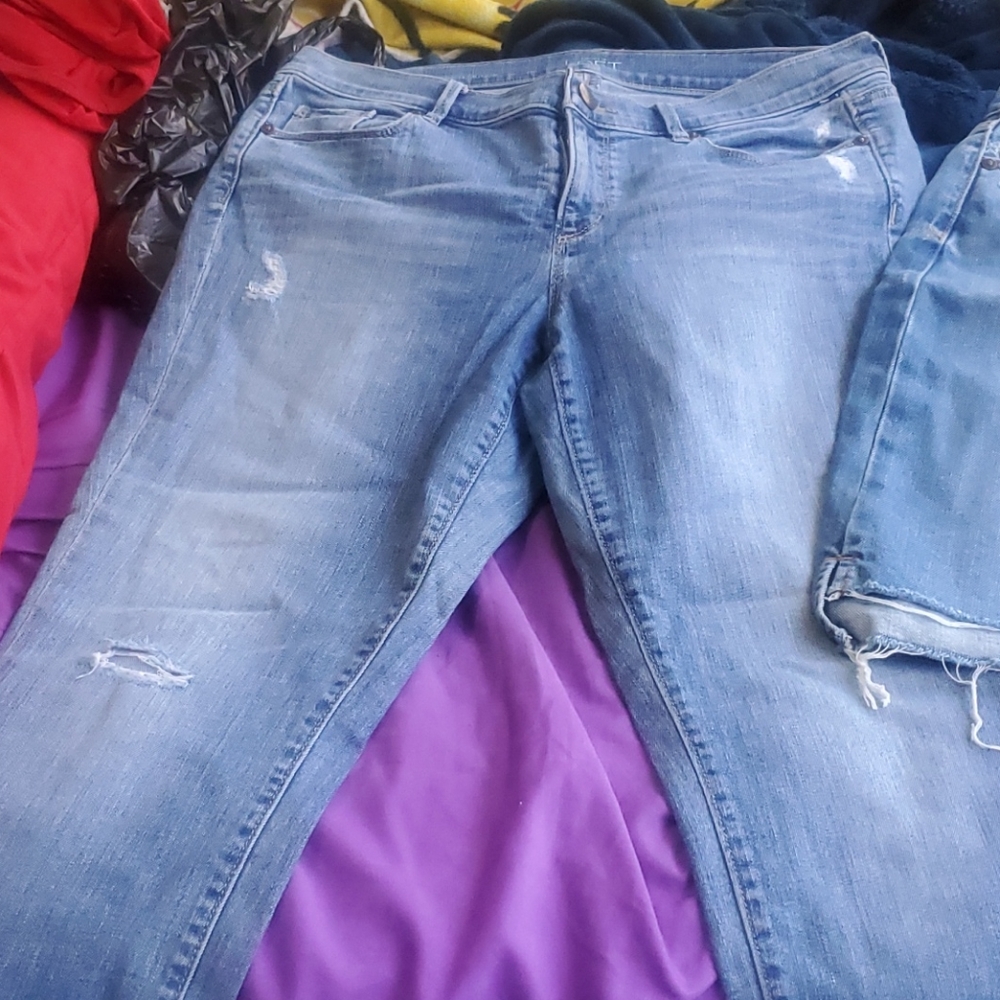 Pair of distress jeans and skirt